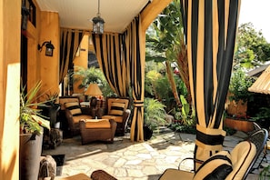 Semi-Enclosed outdoor sitting area w/ heater