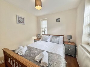 Comfortable double bedroom with wardrobes