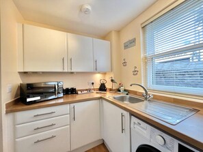 Open plan well equipped kitchen