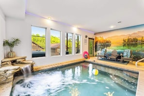 Family Fun Zone – A vibrant indoor pool with pool toys and a scenic mural creates the perfect spot for kids and adults to play together.