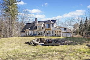 The back of the house, with a awesome fire-pit and large yard for games.