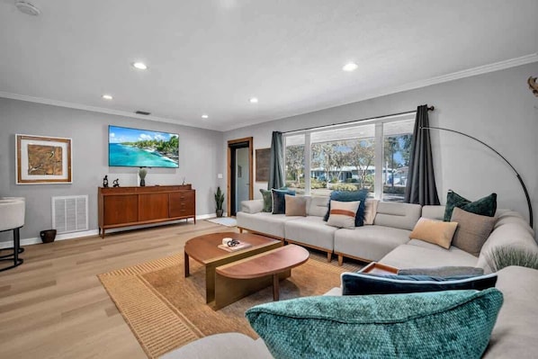 Eclectic and spacious living space with comfy seating spaces.