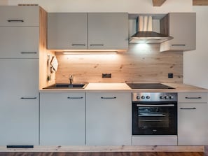 Kitchen Appliance, Kitchen, Countertop, Cabinetry, Furniture, Major Appliance, Interior Design, Home Appliance, Flooring, Wood