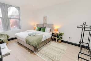 Bedroom 1 : Super king size bed (Twin Single beds that can be separated), Bed linen, clothes rail, mirror, Hangers, Table and Chair