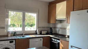 Fully equipped kitchen, including dishwasher, refrigerator and washing machine