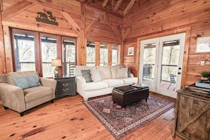 The spacious living area includes a queen pullout sofa