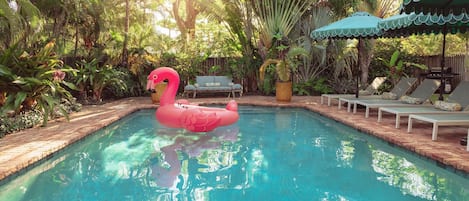 Our idyllic, sun-splashed pool is right out of a summer dream.