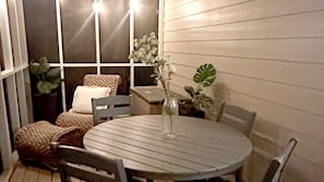 Outdoor Oasis: Dine al fresco on the patio, complete with comfortable seating