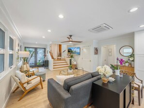 Great room with new luxury vinyl, tons of natural light & huge new kitchen.
