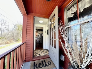 Entering the cottage-