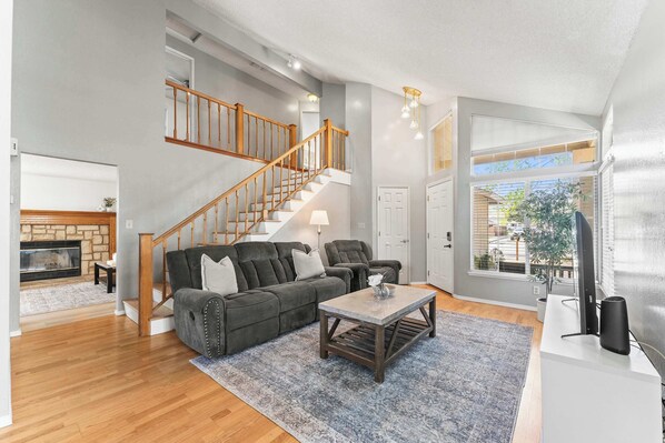 Bright and welcoming, the living room is the perfect space to unwind or catch up with loved ones. 