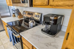 Coffee, cookware, and all the essentials—your kitchen setup is ready from sunrise to supper.