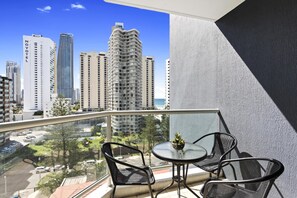 Enjoy your morning coffee in this spacious balcony overlooking the ocean/city