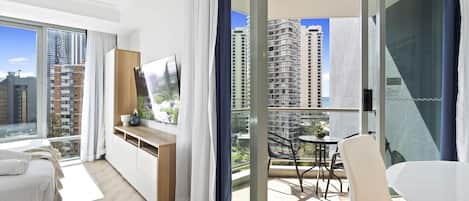 Cozy balcony is right next to the sleeping area and the dining area