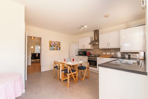 Fully fitted kitchen with dining area - ground floor