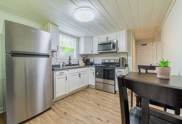 Whip up your favorite meals in this spacious, fully stocked kitchen with modern appliances. Whether you're cooking for yourself or entertaining, it's the perfect spot to enjoy a home-cooked meal during your stay in Columbus near Fort Moore.