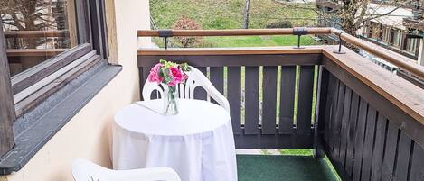 Wood, Furniture, Balcony, Hardwood, Wood Stain, Chair, Outdoor Furniture, Fence, Plank, Houseplant
