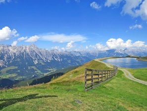 Sky, Mountainous Landforms, Mountain, Hill, Mountain Range, Cloud, Grassland, Highland, Natural Landscape, Ridge