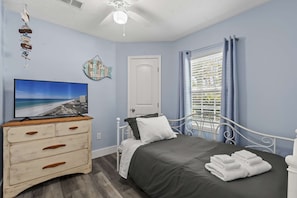 Bedroom 3: Twin trundle bed with mattress protected by a waterproof and bed bug proof mattress protector. Equipped with a smart TV featuring Netflix, Prime Video, YouTube, etc...