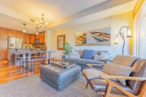 Beautiful open space with seamless transition between kitchen, dining and living areas