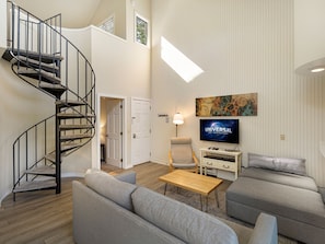 Spiral staircase leads to the loft