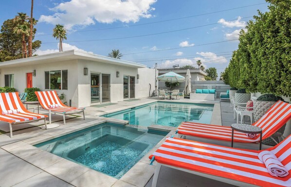 Make a splash or lounge the day away with a private pool and two in-ground spas!