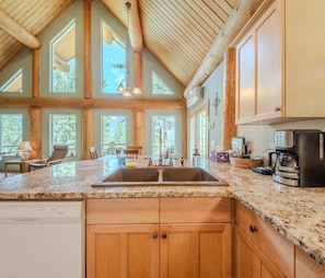 Stocked kitchen with granite counters