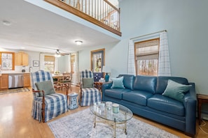 Feel instantly at ease in this bright and spacious living area, with a lofted ceiling that adds an extra touch of coastal charm.