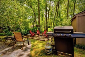 Kick back under the stars with a cozy fire and a sizzling grill.