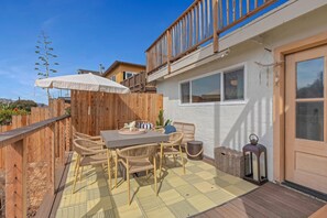 Private outdoor deck with dining area