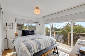 Bedroom one with bay views