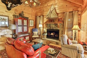Living room with wood-burning fireplace