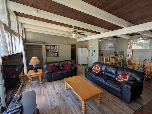 Spacious open-concept kitchen, dining and living area - perfect for gathering!