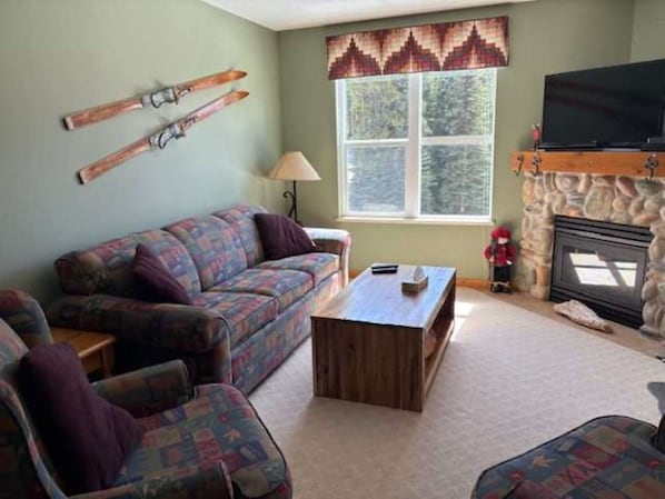Living Room with Gas Fireplace & TV