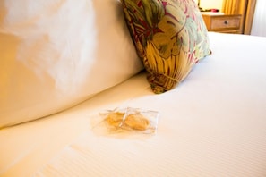 Happiness is curling up in a comfy bed after a long trip