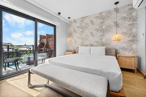 This is the master bedroom of Porta al Sole 9. It’s a serene retreat with a lovely view, perfect for relaxation and unwinding after a long day.
