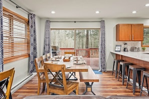 Great for group meals with forest views.