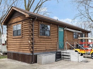 Cozy Log Cabin with Lake View
*Golf Cart Not Included