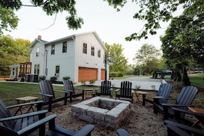 Gather around the firepit for the ideal evening with family.
