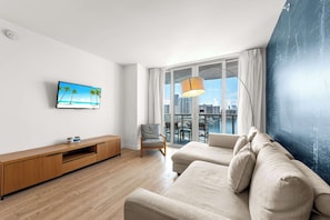From the living room, step onto the connecting balcony to enjoy waterfront panoramas and beautiful sunsets.