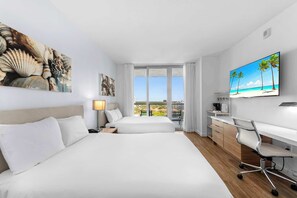 Your waterfront retreat awaits! Our balcony provides front-row seats to boat activity, friendly manatees, and colorful fish, all beneath the sunset's warm glow. Sleep soundly on two full-sized beds.