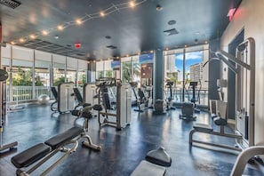 Gym with pool view and intracoastal