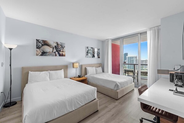 Your waterfront retreat awaits! Our balcony provides front-row seats to boat activity, friendly manatees, and colorful fish, all beneath the sunset's warm glow. Sleep soundly on two full-sized beds.