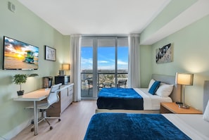 Your waterfront retreat awaits! Our balcony provides front-row seats to boat activity, friendly manatees, and colorful fish, all beneath the sunset's warm glow. Sleep soundly on two full-sized beds.