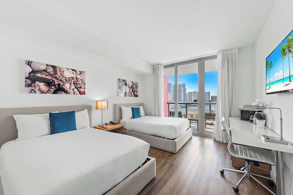 Your waterfront retreat awaits! Our balcony provides front-row seats to boat activity, friendly manatees, and colorful fish, all beneath the sunset's warm glow. Sleep soundly on two full-sized beds.