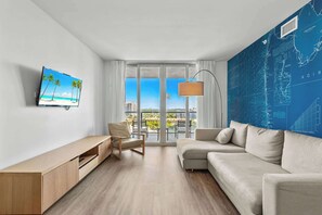 From the living room, step onto the connecting balcony to enjoy waterfront panoramas and beautiful sunsets.