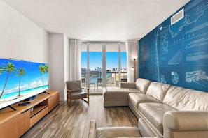 From the living room, step onto the connecting balcony to enjoy waterfront panoramas and beautiful sunsets.