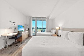 Our well-equipped kitchenette features a mini-fridge, coffee machine, TV, and a convenient desk space.