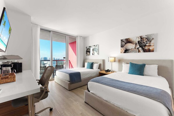 Your waterfront retreat awaits! Our balcony provides front-row seats to boat activity, friendly manatees, and colorful fish, all beneath the sunset's warm glow. Sleep soundly on two full-sized beds.