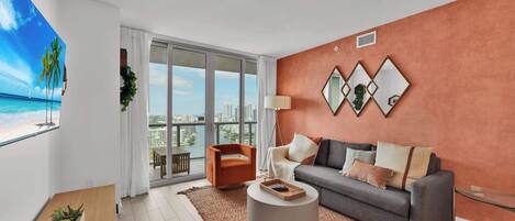 From the living room, step onto the connecting balcony to enjoy waterfront panoramas and beautiful sunsets.